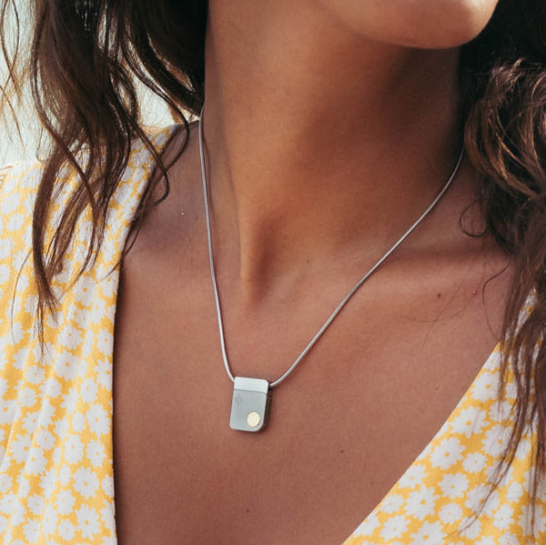 Women wearing QiOne 2 Pro Necklace